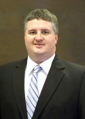 Commissioner Daniel Cowan